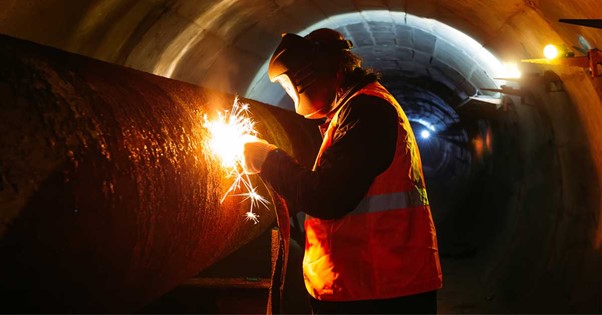 Figure 2 Mine worker in disposable protective clothing